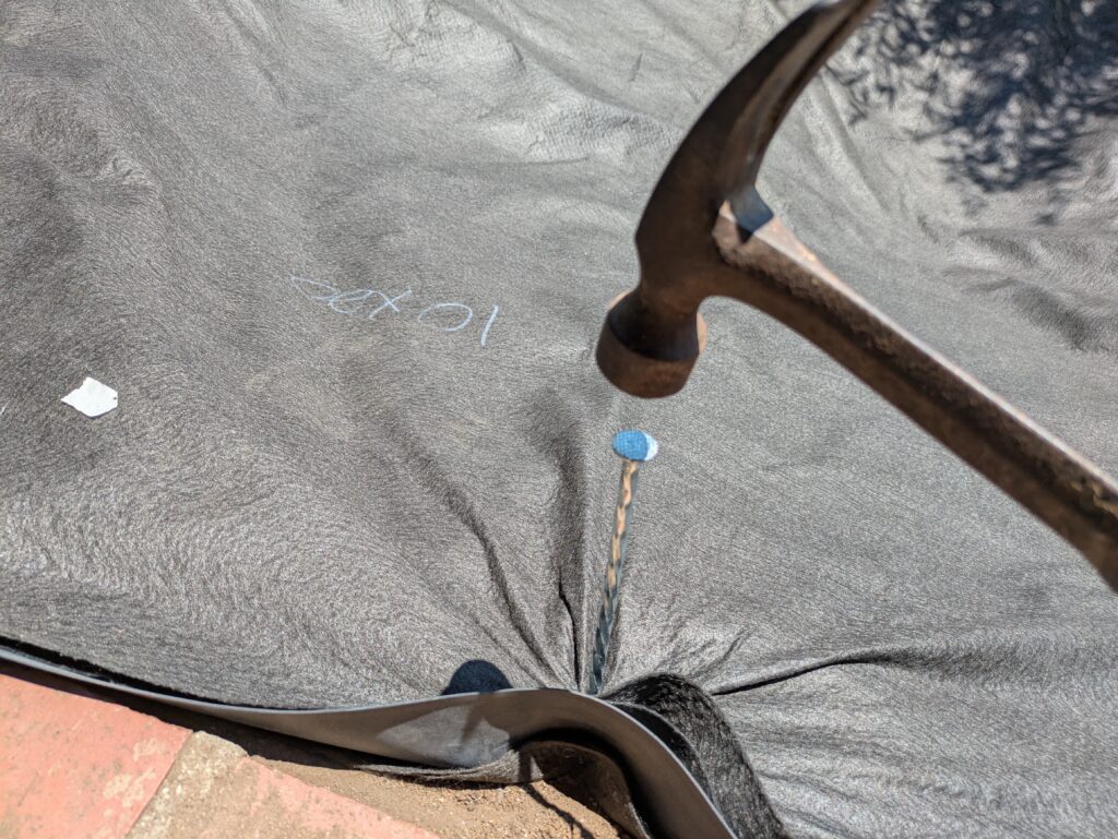 Hammering in Landscape Spikes